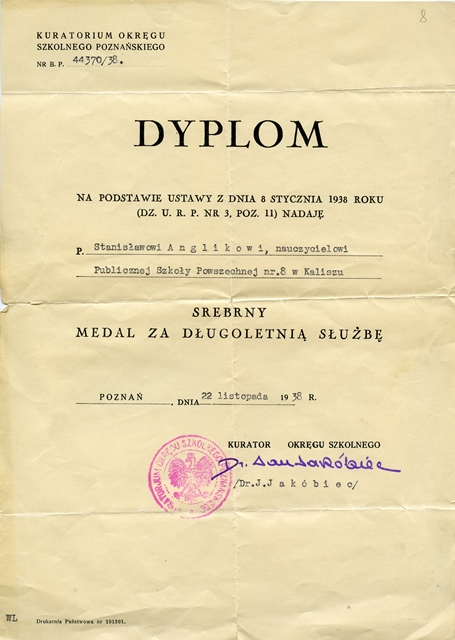 Dyplom przyznający Stanisławowi Aglik Srebrny Medal za długoletnią służbę.