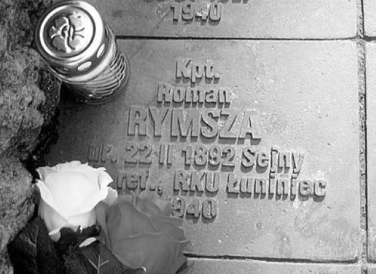 Tablica cmentarna Romana Rymszy na cmentarzu w Charkowie.